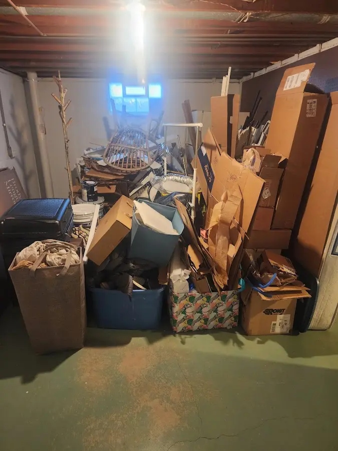 Roll-off dumpster container at job site for Yard Waste Dumpster Rental in Oostburg